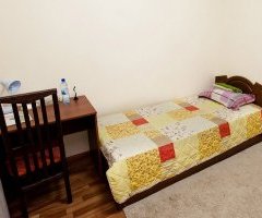 Фото двухместного номера с двумя односпальными кроватями Отель Вояж Тюмень